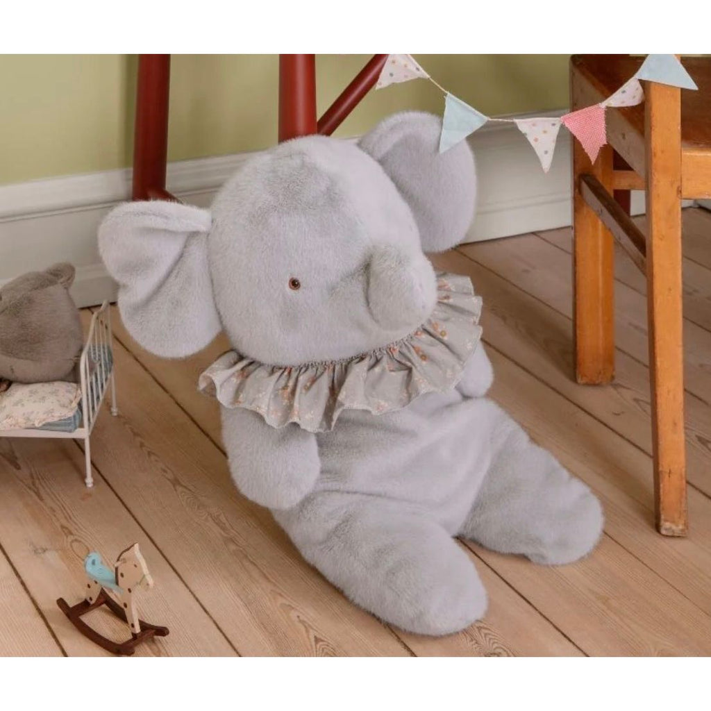 Gray plush elephant toy with a ruffled detail on a white background