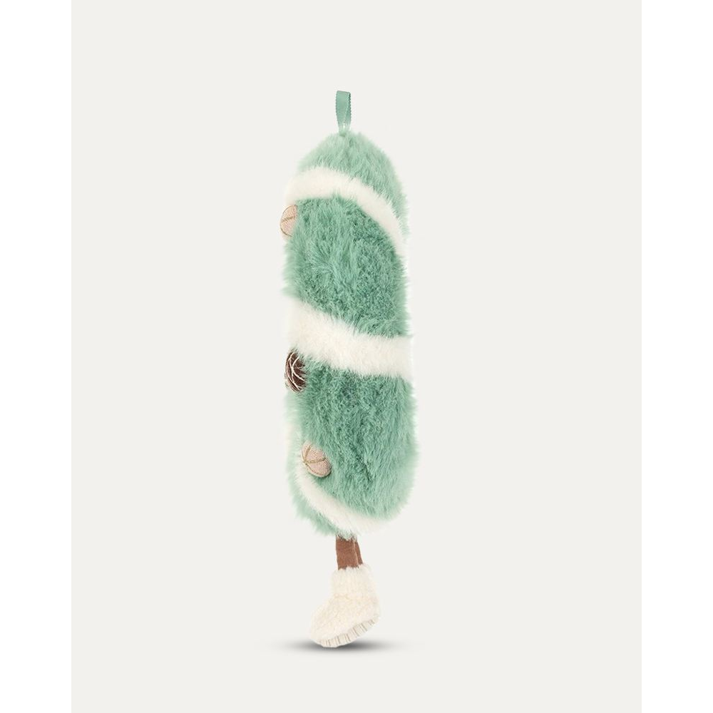 A mint green and white fuzzy Christmas wreath plush ornament with a smiling face, small brown pinecone decorations, and white boot-shaped feet, shown on a light gray background.