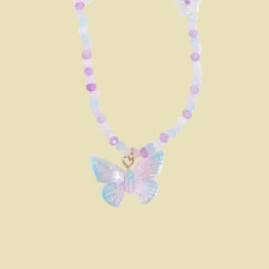 Two beaded necklaces displayed side by side on a plain white background. One necklace is pastel lavender and pink with white flower charms and a blue iridescent butterfly pendant.