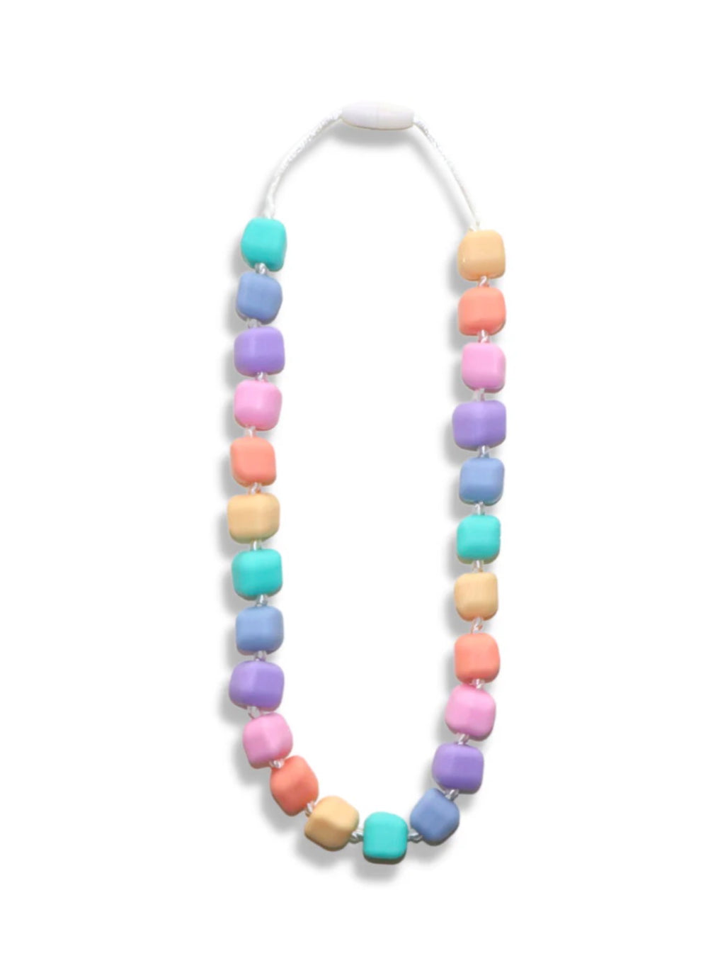 Child holding a colorful necklace with a plain background