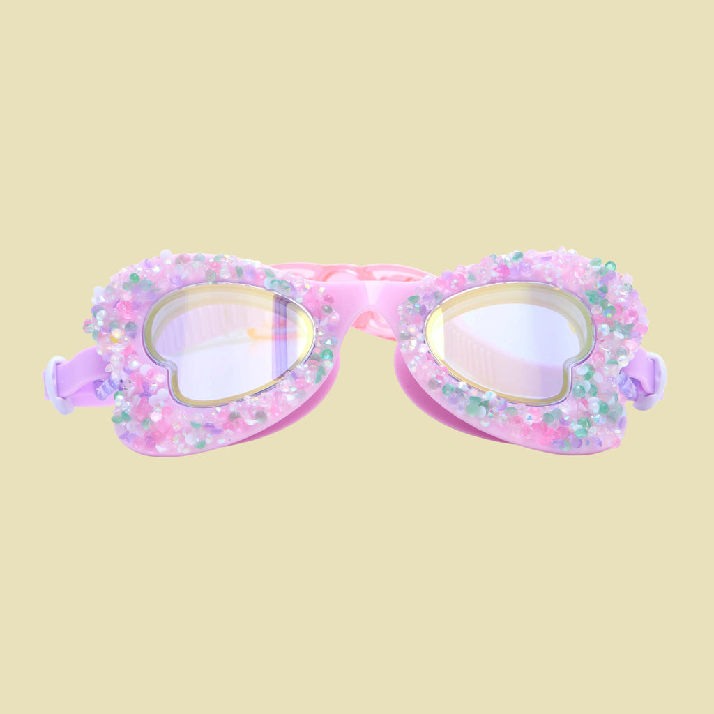 Pink heart-shaped sunglasses with glittery finish on a white background