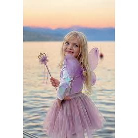 Purple fairy costume set with wings, skirt, and wand on a white background