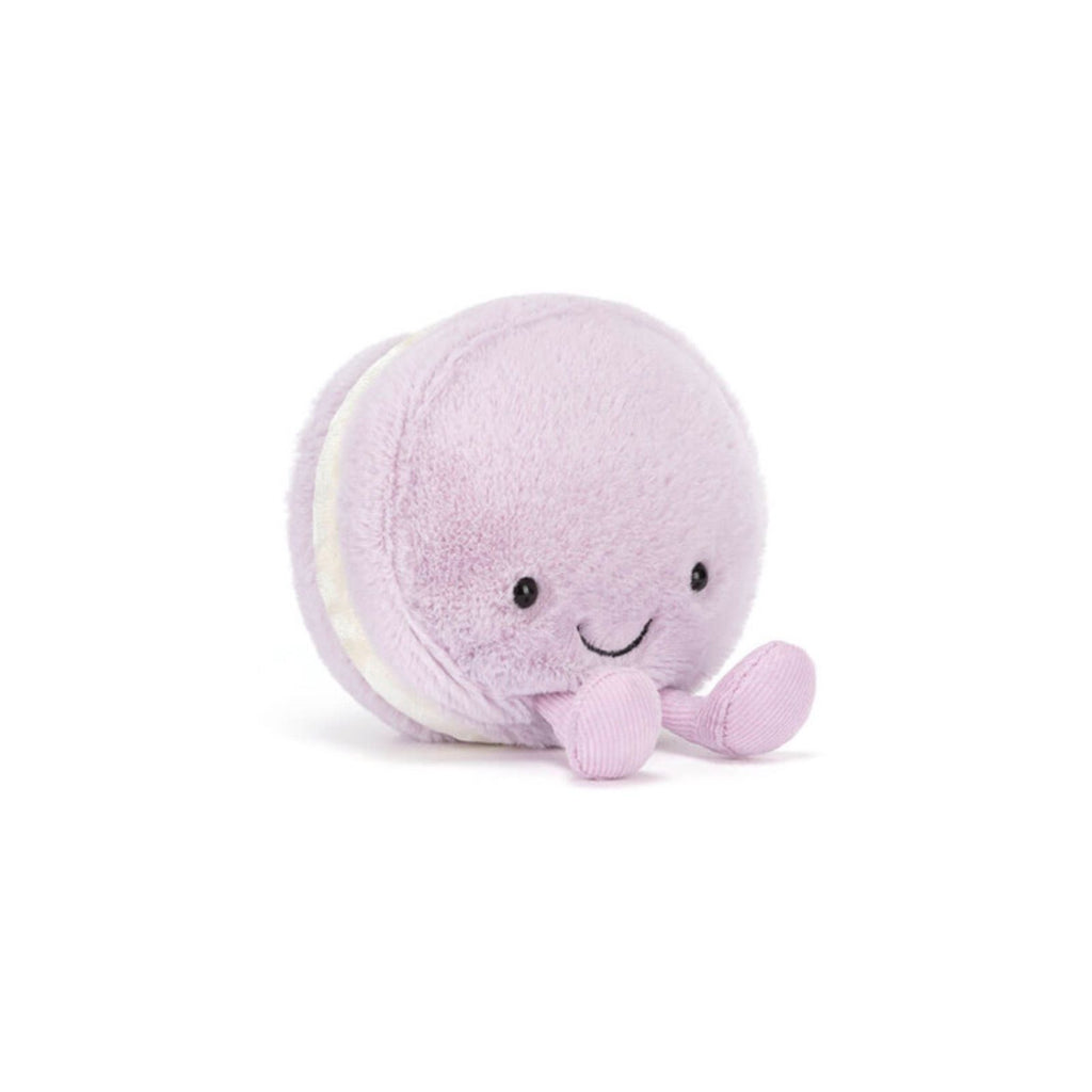 Plush toy octopus with a smile on a white background