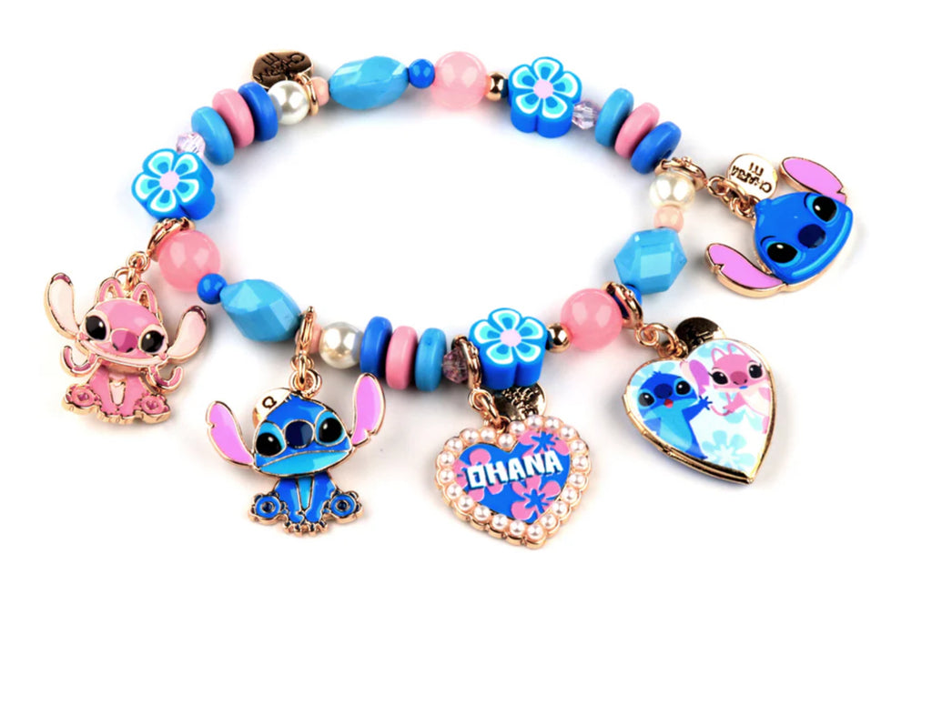 Blue cartoon character charm with pink accents on a white background