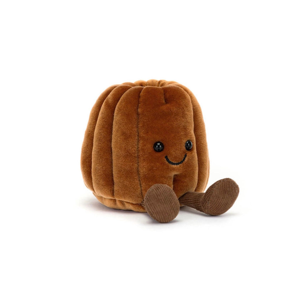 Brown plush toy with a smiling face on a white background