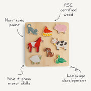 Wooden puzzle with farm animal figures on a white background
