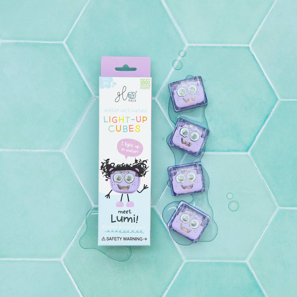Glo Pals Light-Up Cubes packaging and three light-up cubes designed with cute character faces on a teal background.
