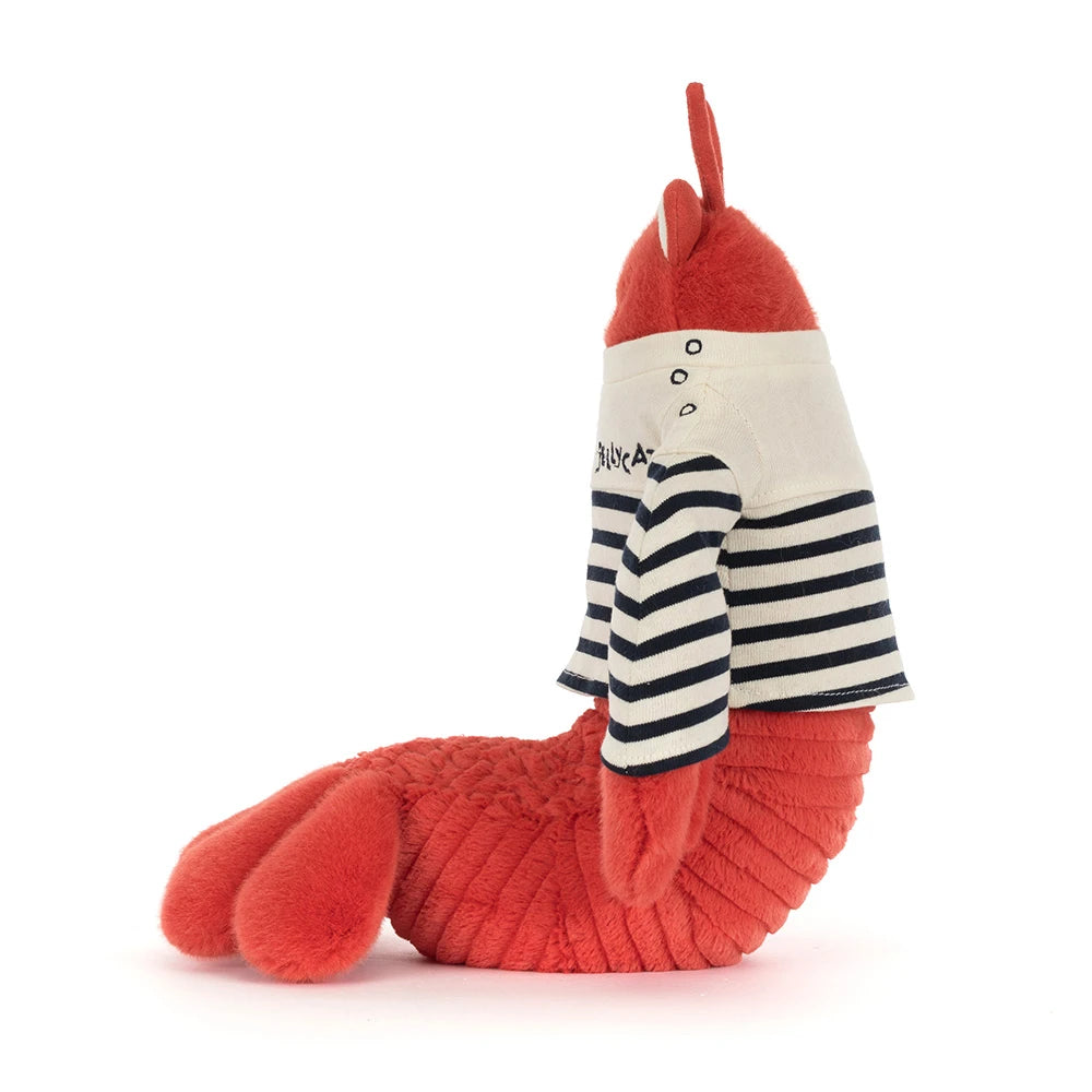 Plush toy lobster with a striped shirt on a white background