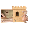Wooden castle toy with a mouse doll in a dress on a white background