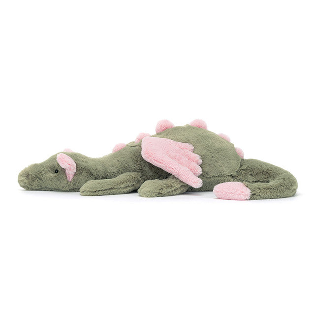 Green plush dinosaur toy with pink accents on a white background