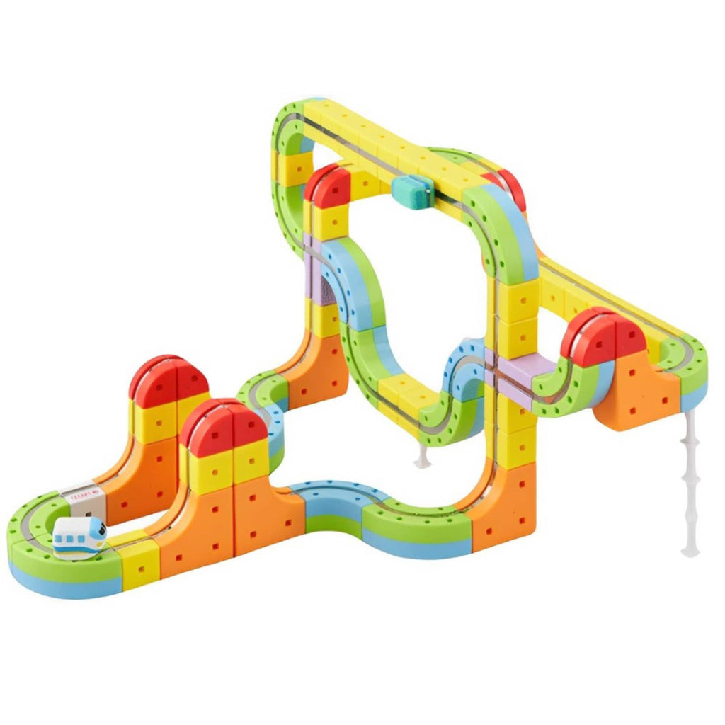 Colorful magnetic marble run toy set with packaging on a white background
