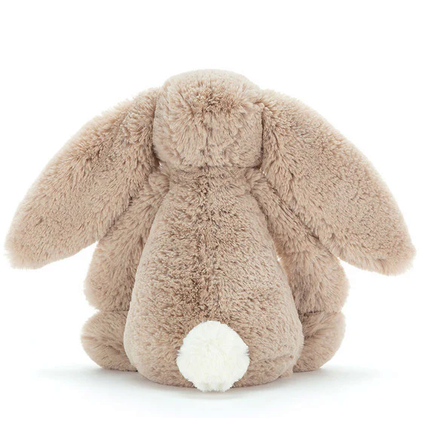 Plush bunny toy on a white background