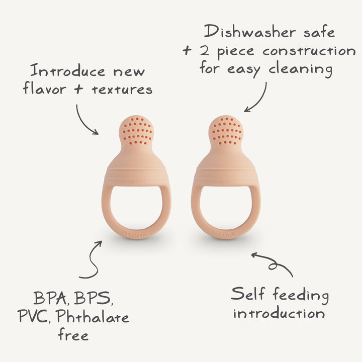 Blush colored silicone food feeder with small holes