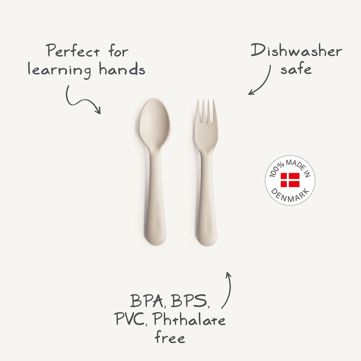 Mint green spoon and fork set on a white background